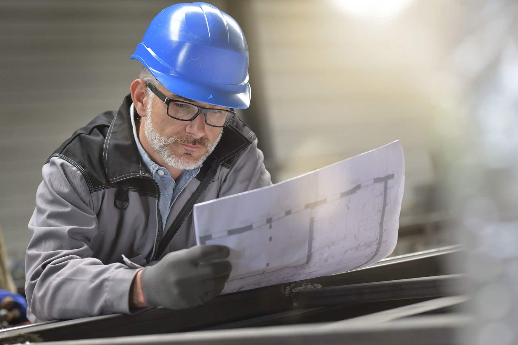 Decontamination company worker planning job site